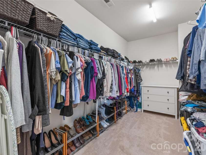 6440 Ancient Way, Fort Mill, SC 29707.  MLS# CAR4413430, YatesRealty ID 45254. Generously sized primary walk-in closet with room for everything.