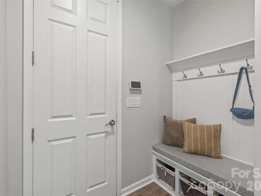 6440 Ancient Way, Fort Mill, SC 29707.  MLS# CAR4413430, YatesRealty ID 45254. Located right off the garage entry, this convenient drop zone features built-in bench seating, storage cubbies, and coat hooks to keep daily clutter organized and out of sight.