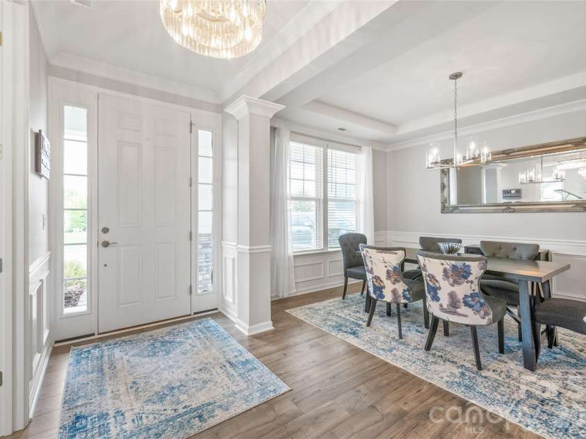 6440 Ancient Way, Fort Mill, SC 29707.  MLS# CAR4413430, YatesRealty ID 45254. Soaring 8-foot doors throughout the first floor add an elevated, grand feel that enhances the main level's open, airy architecture.