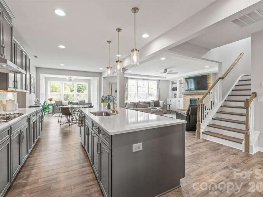 6440 Ancient Way, Fort Mill, SC 29707.  MLS# CAR4413430, YatesRealty ID 45254. The ultimate open-concept layout...the kitchen connects seamlessly to the sunlit breakfast area, cozy living room, and cheerful sunroom for effortless everyday living and entertaining.