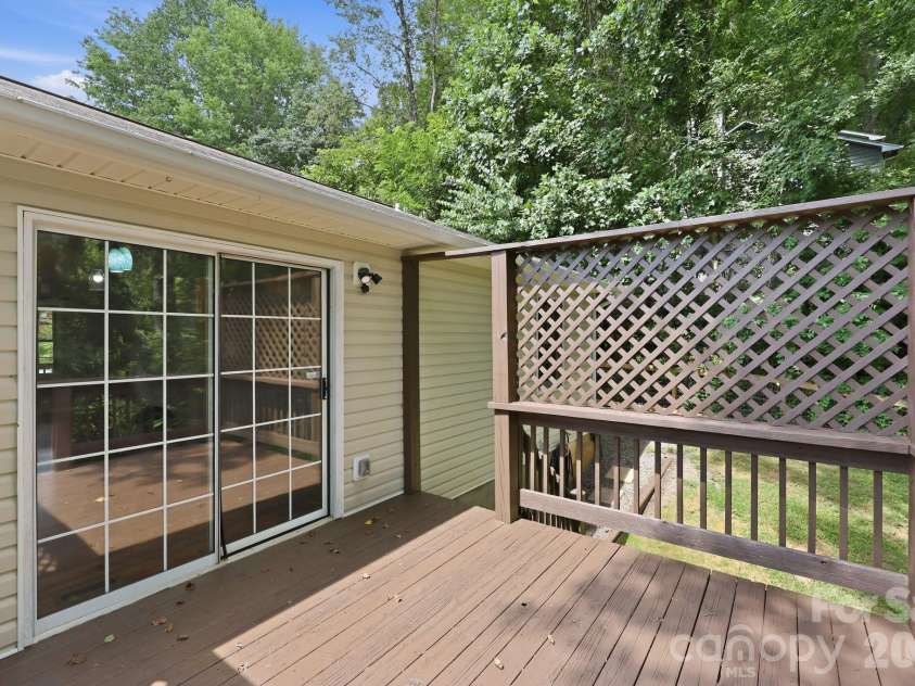 16 Westwood Drive, Candler, NC 28715.  MLS# CAR4413861, YatesRealty ID 45256. Private Rear Deck