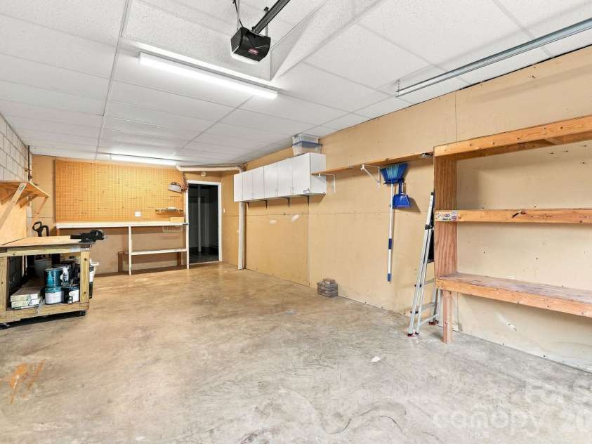 16 Westwood Drive, Candler, NC 28715.  MLS# CAR4413861, YatesRealty ID 45256. Workshop space
