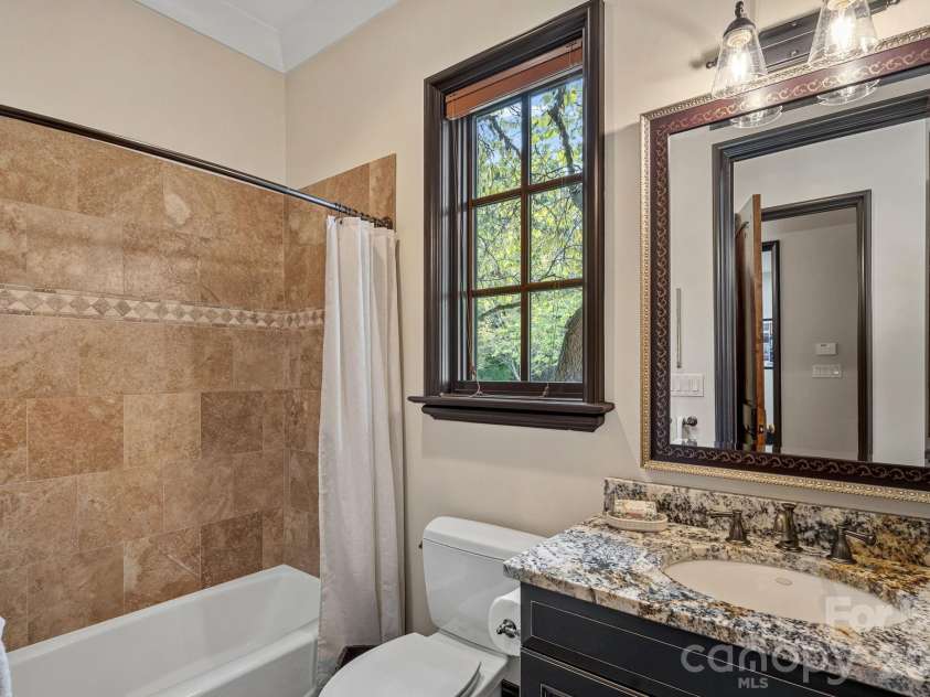 1807 Charden Road, Davidson, NC 28036.  MLS# CAR4410919, YatesRealty ID 45262. Ensuite bath on main level.