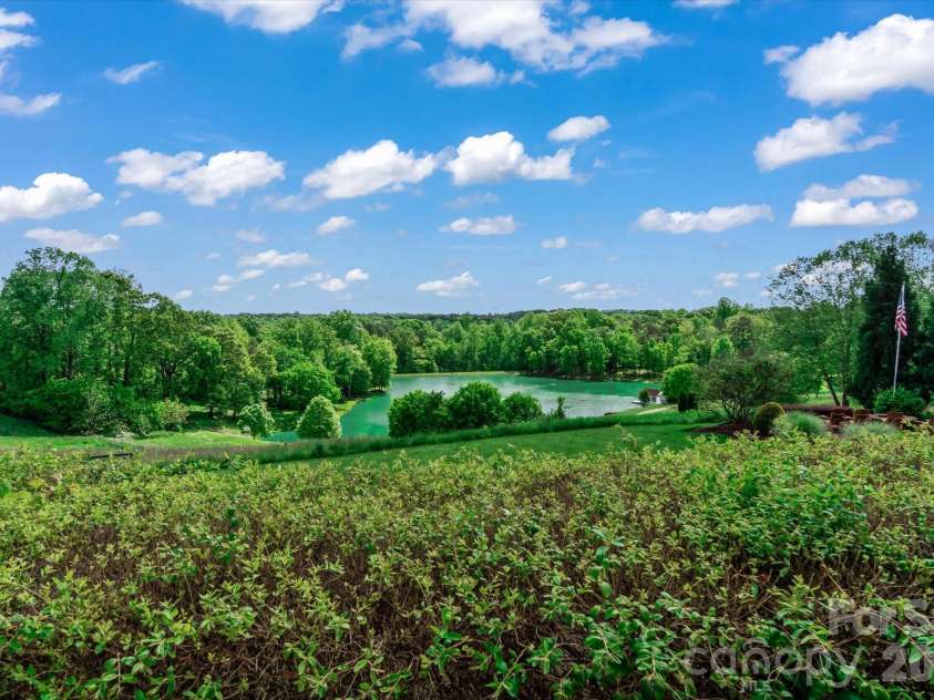 1807 Charden Road, Davidson, NC 28036.  MLS# CAR4410919, YatesRealty ID 45262. Expansive landscape with elevated views creates an atmosphere of serenity.