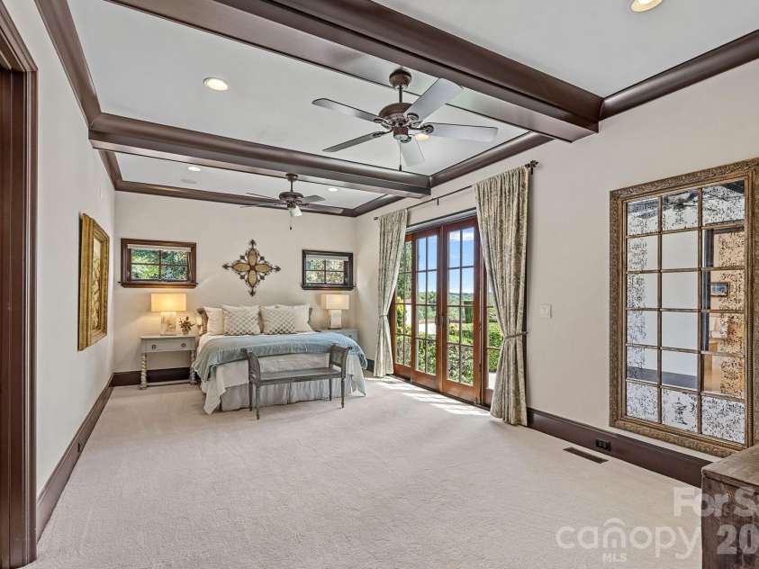 1807 Charden Road, Davidson, NC 28036.  MLS# CAR4410919, YatesRealty ID 45262. Private owners retreat on the main level.