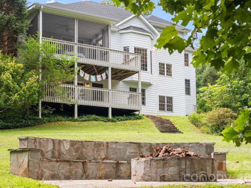 210 Clear Vista Circle, Asheville, NC 28805.  MLS# CAR4411634, YatesRealty ID 45263. Beautiful Stone Firepit + Bench