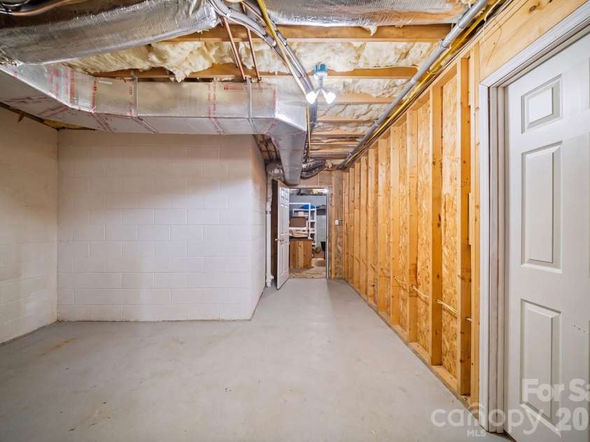 210 Clear Vista Circle, Asheville, NC 28805.  MLS# CAR4411634, YatesRealty ID 45263. Unfinished Lower Level Space