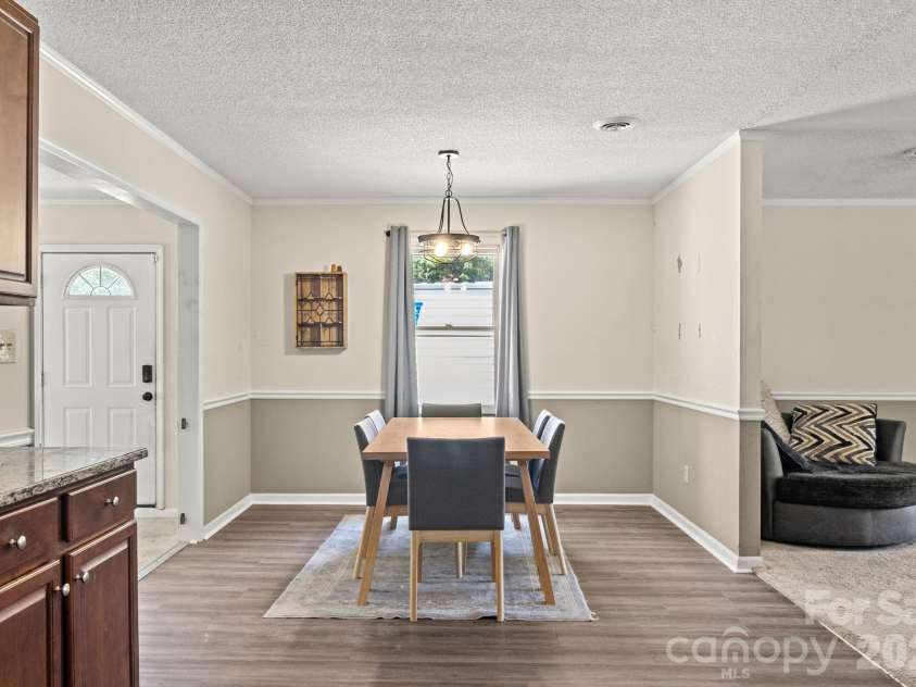 1820 Bridgewood Drive, Lancaster, SC 29720.  MLS# CAR4410487, YatesRealty ID 45264. Dining area with new light fixture