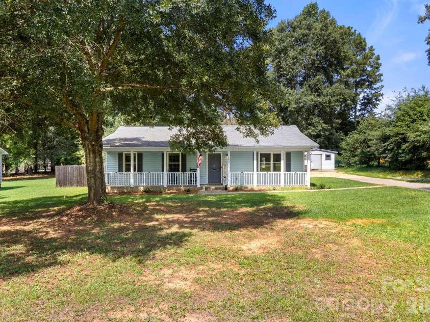 1820 Bridgewood Drive, Lancaster, SC 29720.  MLS# CAR4410487, YatesRealty ID 45264. Nice shade tree and a rocking chair front porch