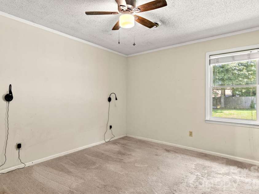 1820 Bridgewood Drive, Lancaster, SC 29720.  MLS# CAR4410487, YatesRealty ID 45264. Spacious Primary bedroom