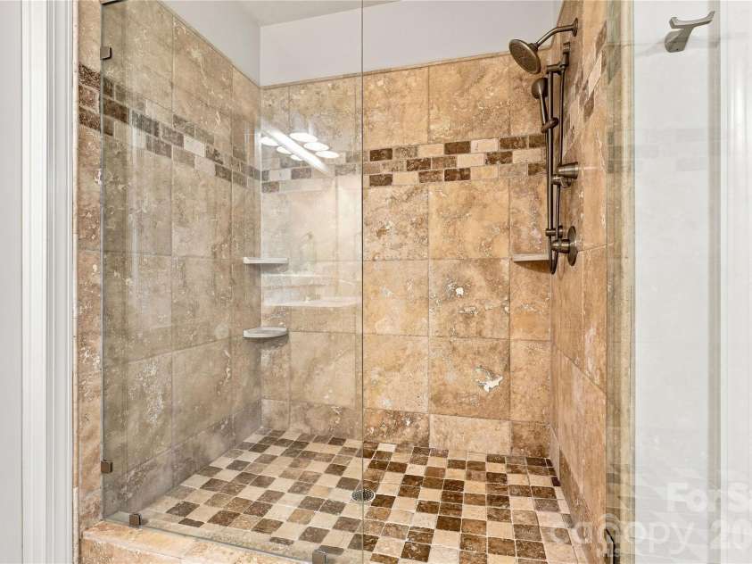 7768 Burning Ridge Drive, Stanley, NC 28164.  MLS# CAR4411753, YatesRealty ID 45272. A Spa-Inspired Retreat