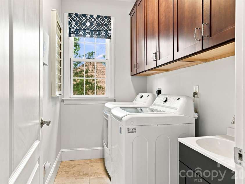 7768 Burning Ridge Drive, Stanley, NC 28164.  MLS# CAR4411753, YatesRealty ID 45272. A Thoughtfully Designed Laundry