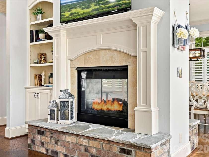 7768 Burning Ridge Drive, Stanley, NC 28164.  MLS# CAR4411753, YatesRealty ID 45272. Double-sided fireplace