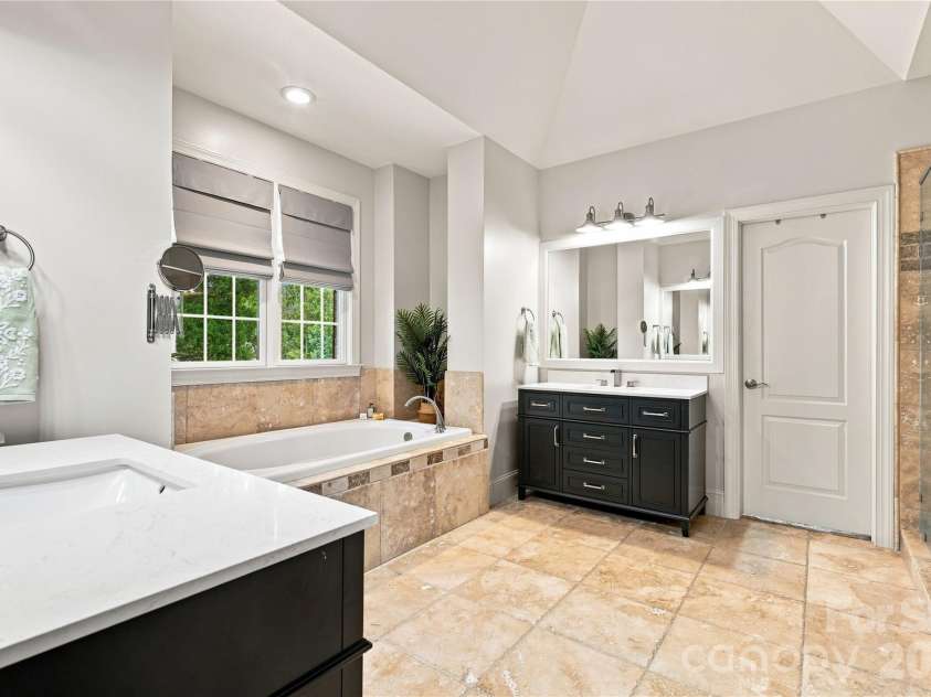 7768 Burning Ridge Drive, Stanley, NC 28164.  MLS# CAR4411753, YatesRealty ID 45272. Primary Bath: A Refined Retreat