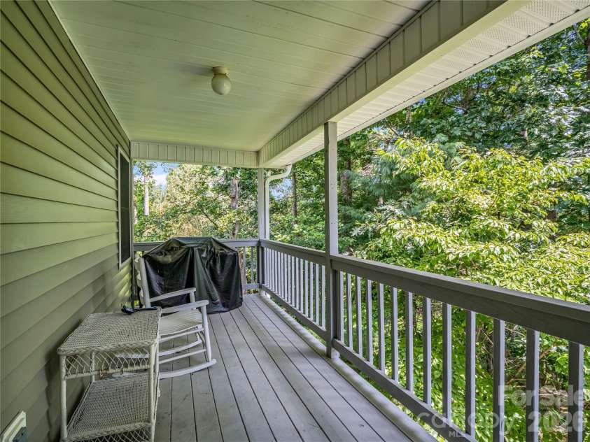311 Ewarts Hill Road, Hendersonville, NC 28739.  MLS# CAR4414180, YatesRealty ID 45274. Covered deck on main level