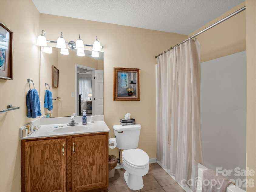 311 Ewarts Hill Road, Hendersonville, NC 28739.  MLS# CAR4414180, YatesRealty ID 45274. Third Bath on lower level