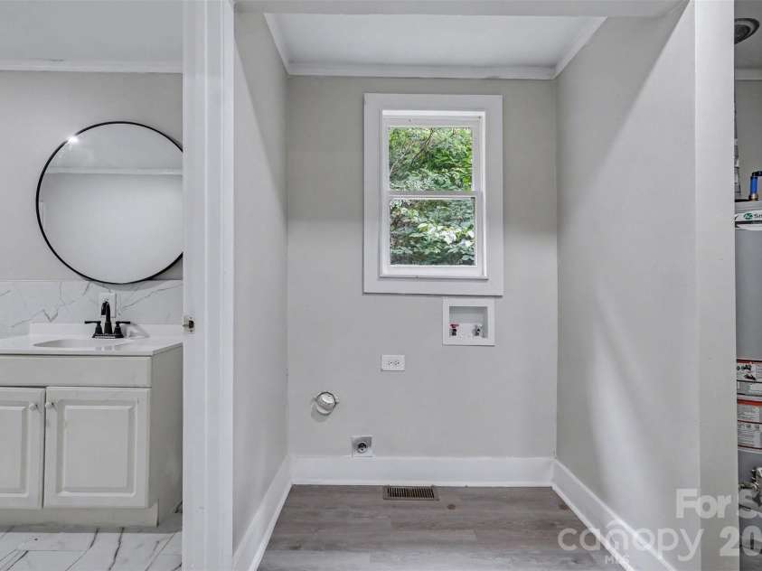 3860 Rock Hill Church Road, Concord, NC 28027.  MLS# CAR4414954, YatesRealty ID 45278. Hallway laundry hookup