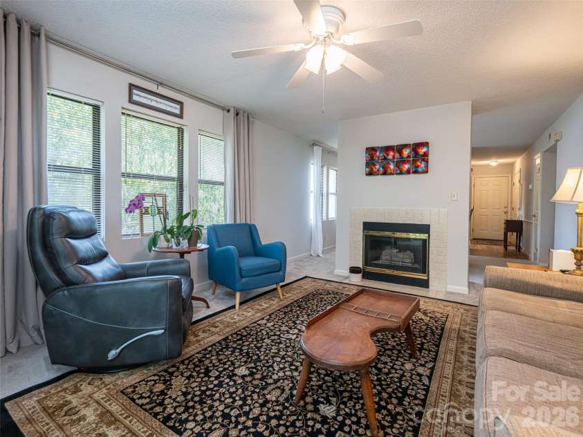 1406 Abbey Circle, Asheville, NC 28805.  MLS# CAR4415355, YatesRealty ID 45281. Fireplace with gas logs