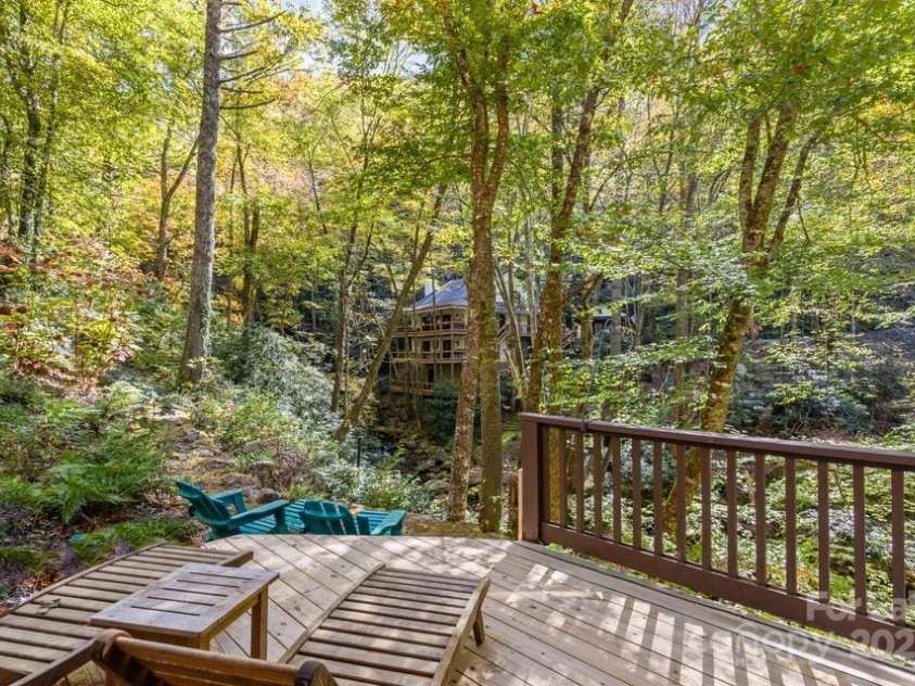 187 Big Buck Road, Highlands, NC 28741.  MLS# CAR4317414, YatesRealty ID 45286. Lower-Level Deck & Stone Patio