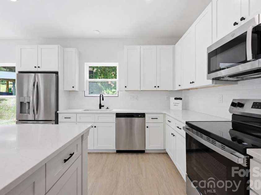 5016 Hoover Drive, Charlotte, NC 28269.  MLS# CAR4414075, YatesRealty ID 45286. Virtually staged photo
