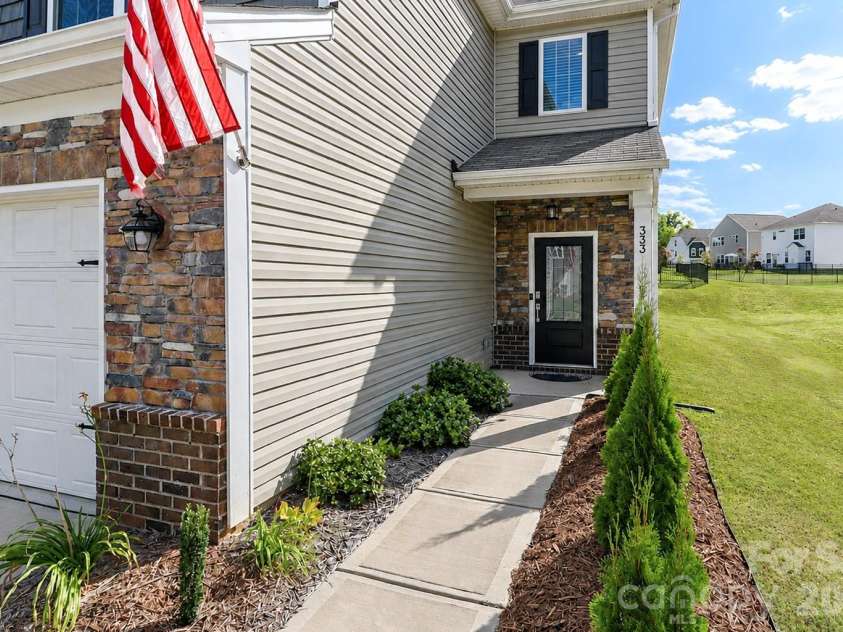 333 Kennerly Center Drive, Mooresville, NC 28115.  MLS# CAR4413957, YatesRealty ID 45290. Front Door