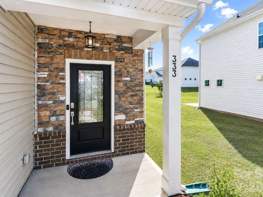 333 Kennerly Center Drive, Mooresville, NC 28115.  MLS# CAR4413957, YatesRealty ID 45290. Front Door