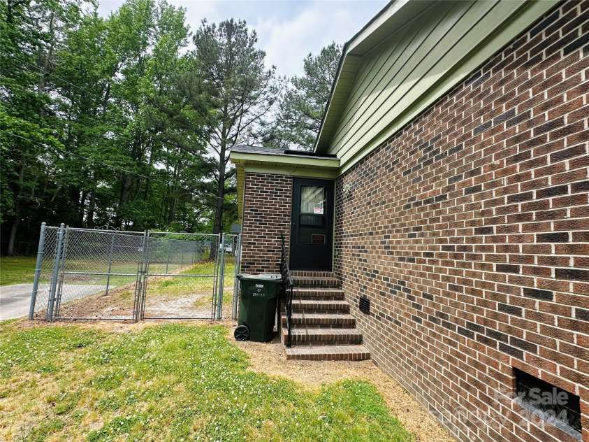 612 Dr Martin Luther King Jr Avenue, Enfield, NC 27823.  MLS# CAR4145152, YatesRealty ID 453. Side door