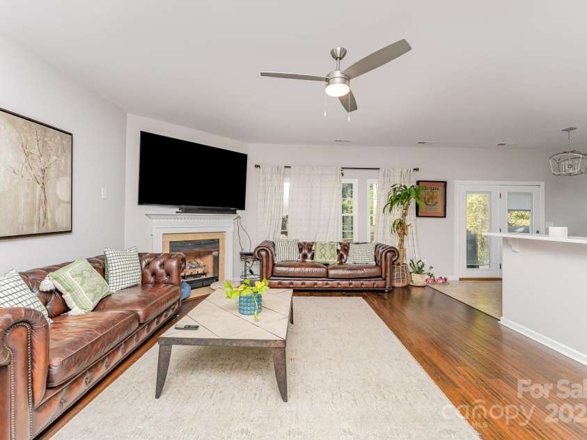 4194 Clifftonville Avenue, Concord, NC 28025.  MLS# CAR4305827, YatesRealty ID 4530. Beautiful family room with fireplace 