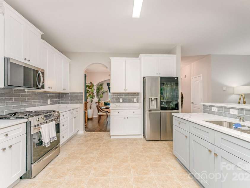 4194 Clifftonville Avenue, Concord, NC 28025.  MLS# CAR4305827, YatesRealty ID 4530. Beautiful Quartz countertops are brand new Grey island with new cabinets and countertops 