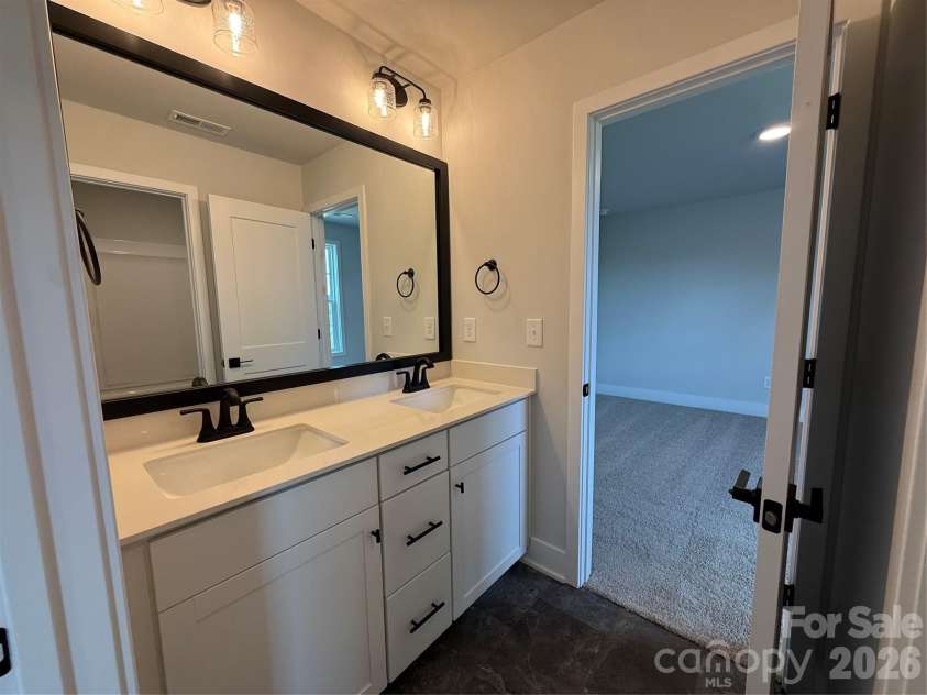 158 Kerr Walk Drive, Statesville, NC 28677.  MLS# CAR4415227, YatesRealty ID 45300. Jack & Jill Bathroom between Flex Space rooms 1 & 2