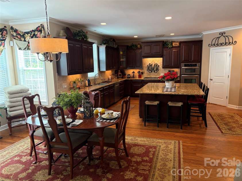 17228 Marbella Lane, Indian Land, SC 29707.  MLS# CAR4413011, YatesRealty ID 45302. Breakfast room with kitchen in background