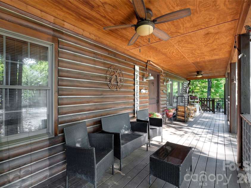 2440 Mount Lebanon Road, Campobello, SC 29322.  MLS# CAR4416231, YatesRealty ID 45313. Front to Side Porch