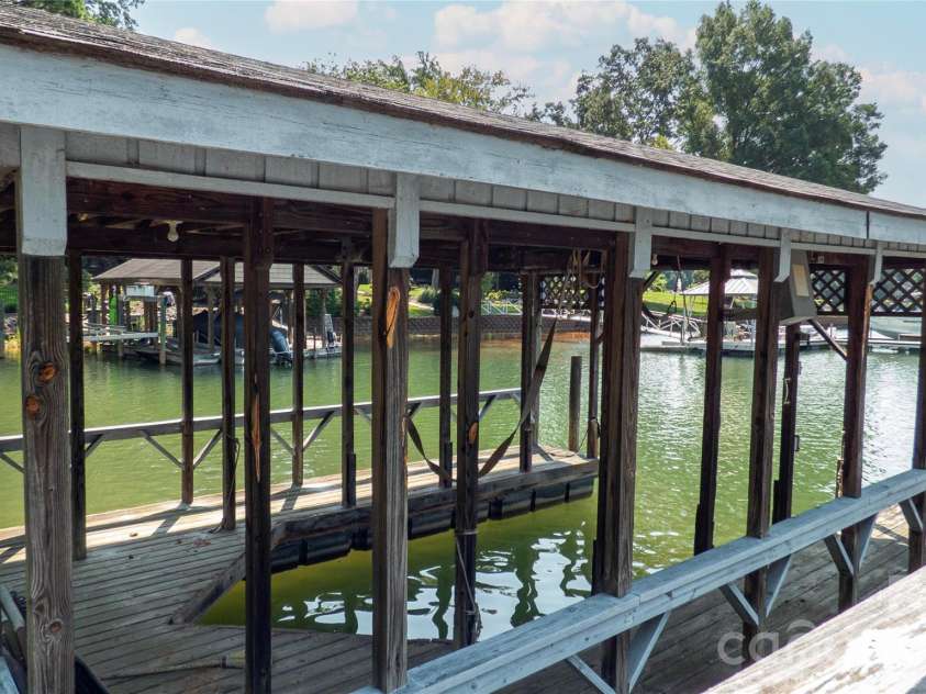 115 Rainbow Lane, Mooresville, NC 28117.  MLS# CAR4413654, YatesRealty ID 45316. Property's Private Covered Dock