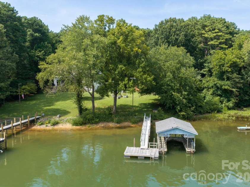 115 Rainbow Lane, Mooresville, NC 28117.  MLS# CAR4413654, YatesRealty ID 45316. Property's Private Covered Dock