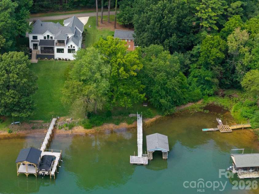 115 Rainbow Lane, Mooresville, NC 28117.  MLS# CAR4413654, YatesRealty ID 45316. Property's Private Covered Dock