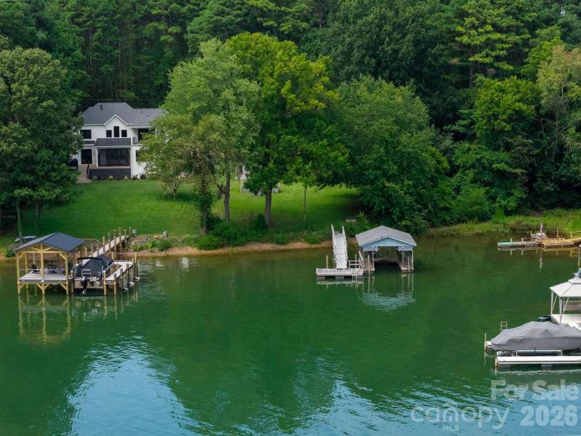 115 Rainbow Lane, Mooresville, NC 28117.  MLS# CAR4413654, YatesRealty ID 45316. Property's Private Covered Dock
