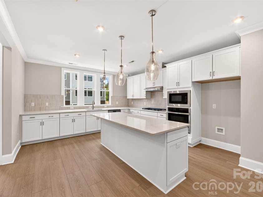 6008 Yellow Buckeye Drive, Charlotte, NC 28277.  MLS# CAR4396142, YatesRealty ID 45319. Gourmet Kitchen with white cabinets