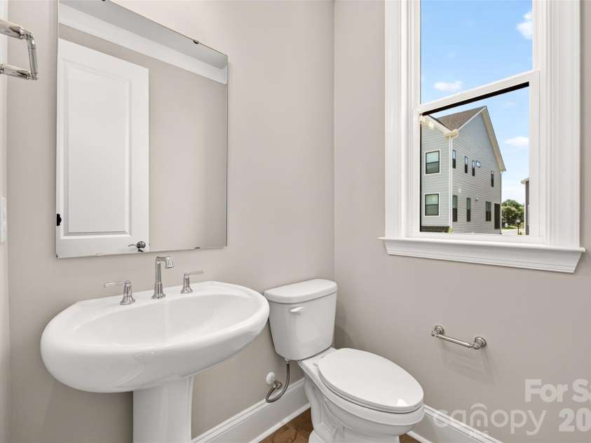 6008 Yellow Buckeye Drive, Charlotte, NC 28277.  MLS# CAR4396142, YatesRealty ID 45319. Second floor powder room