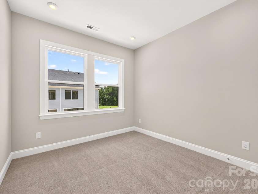 6008 Yellow Buckeye Drive, Charlotte, NC 28277.  MLS# CAR4396142, YatesRealty ID 45319. Secondary bedroom