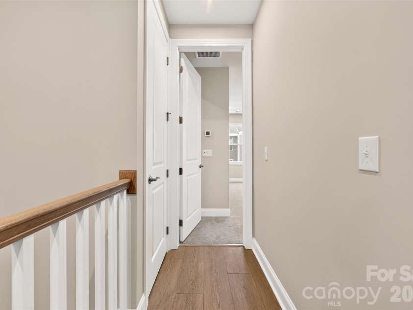 6008 Yellow Buckeye Drive, Charlotte, NC 28277.  MLS# CAR4396142, YatesRealty ID 45319. Third floor hallway with open rails