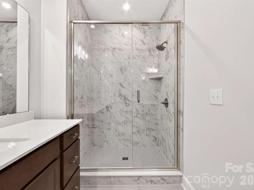 6008 Yellow Buckeye Drive, Charlotte, NC 28277.  MLS# CAR4396142, YatesRealty ID 45319. Tiled walk-in shower