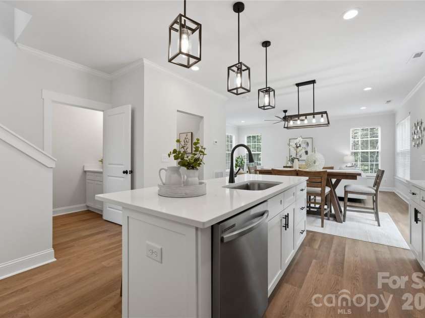 14133 Woodhurst Lane, Mint Hill, NC 28227.  MLS# CAR4415428, YatesRealty ID 45326. Half bath off kitchen