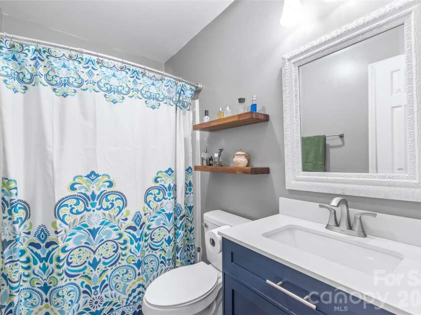 2241 Indian Cross Trail, Matthews, NC 28104.  MLS# CAR4413908, YatesRealty ID 45328. Main home second full bath