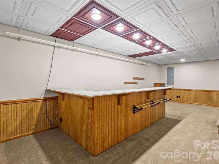 1061 Fairway Drive, Kannapolis, NC 28081.  MLS# CAR4319984, YatesRealty ID 4533. Bar Area in Basement