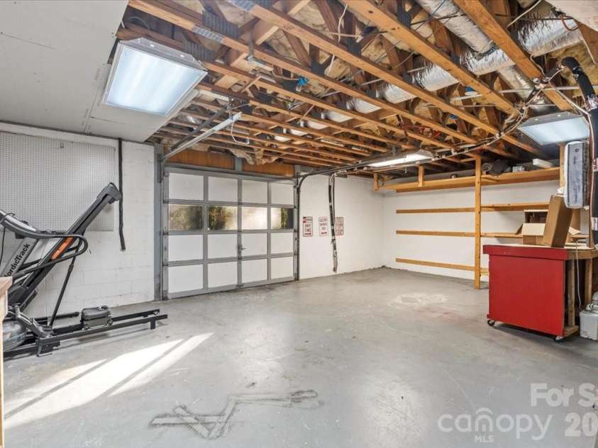 1061 Fairway Drive, Kannapolis, NC 28081.  MLS# CAR4319984, YatesRealty ID 4533. Garage shop located in basement with walk out access