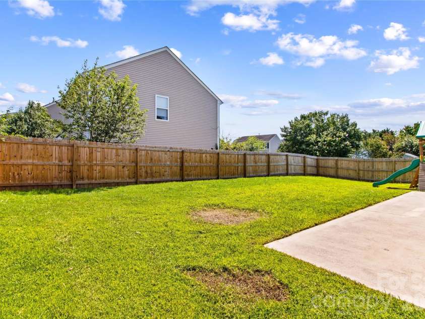 159 Bluffton Road, Mooresville, NC 28115.  MLS# CAR4408481, YatesRealty ID 45334. Enjoy the Private Back yard!