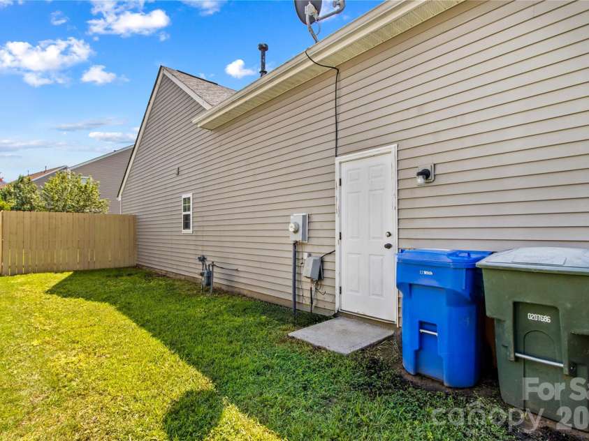 159 Bluffton Road, Mooresville, NC 28115.  MLS# CAR4408481, YatesRealty ID 45334. Garage side Door