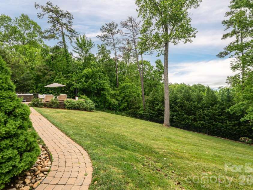 153 Mills Place, Asheville, NC 28804.  MLS# CAR4378268, YatesRealty ID 45336. Backyard