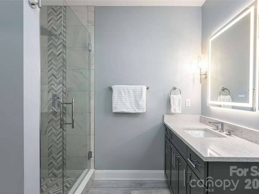 153 Mills Place, Asheville, NC 28804.  MLS# CAR4378268, YatesRealty ID 45336. Lower full bathroom