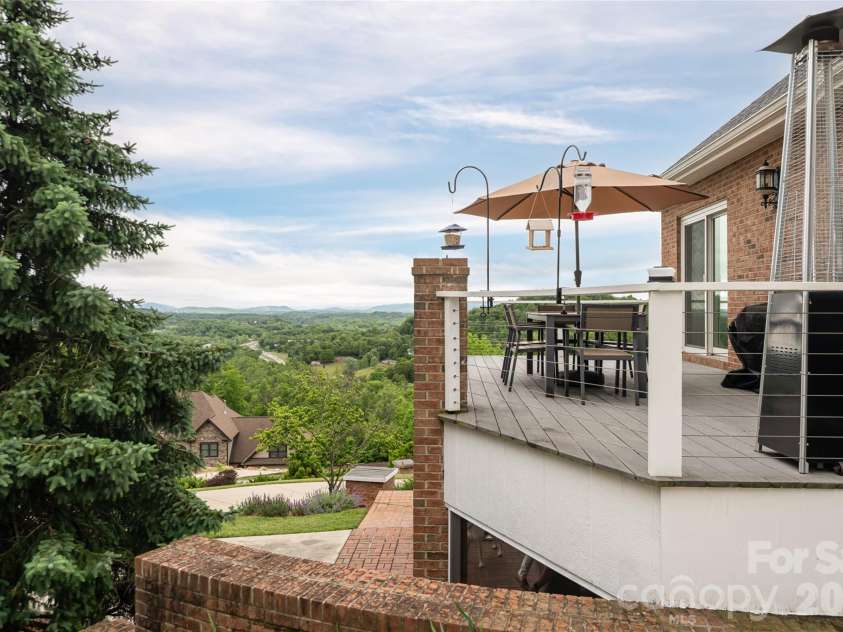 153 Mills Place, Asheville, NC 28804.  MLS# CAR4378268, YatesRealty ID 45336. Side deck and views